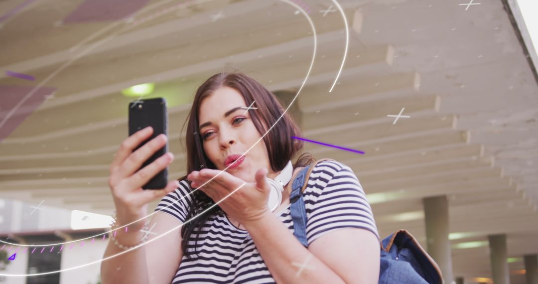 Woman Interacts with Smartphone as Lines Simulate Digital Connectivity