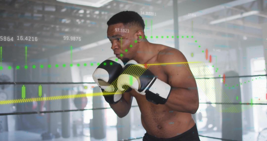 Determined Boxer in Arena with Digital Graphs and Analytics Overlay