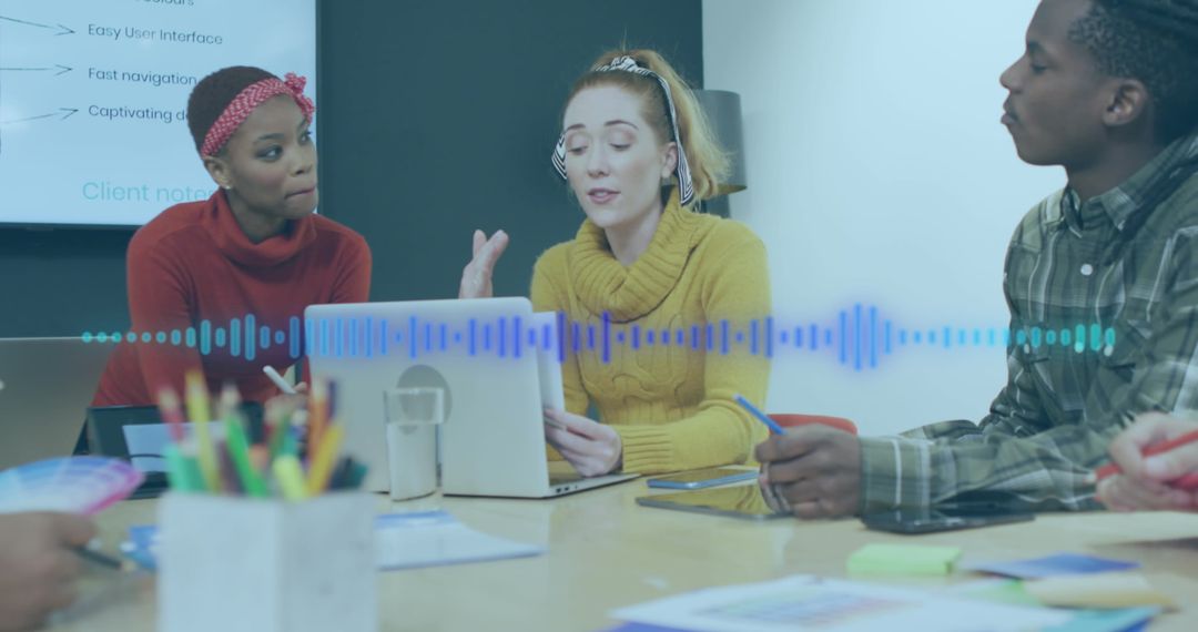 Diverse Team Collaborating with Sound Interface in Modern Office