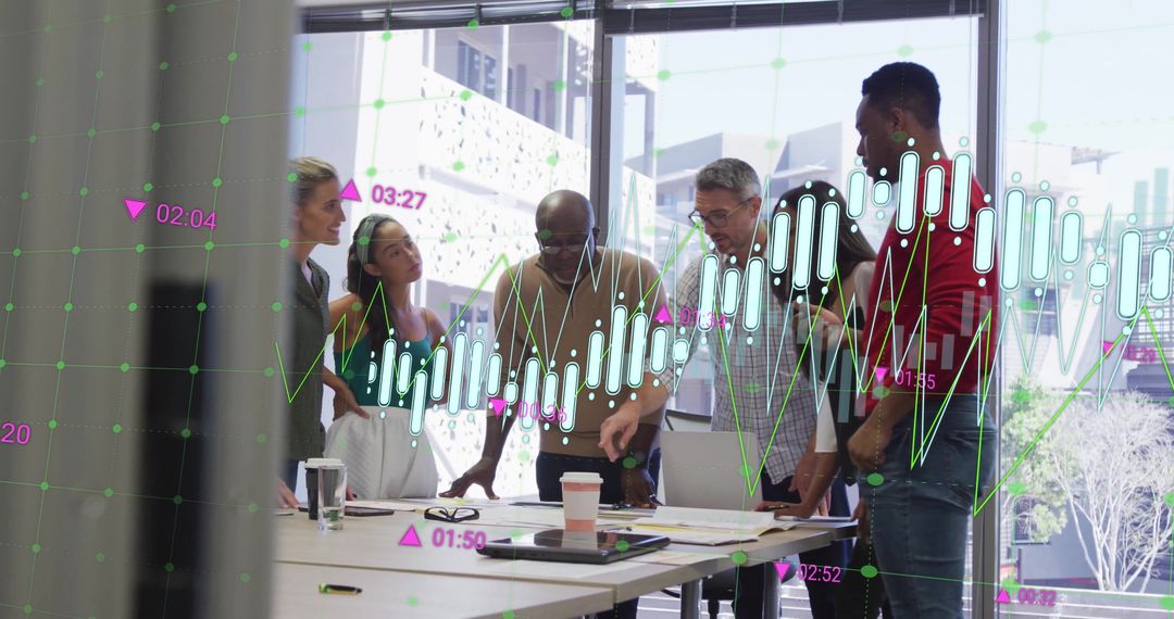 Diverse Team Analyzing Digital Financial Data During Meeting