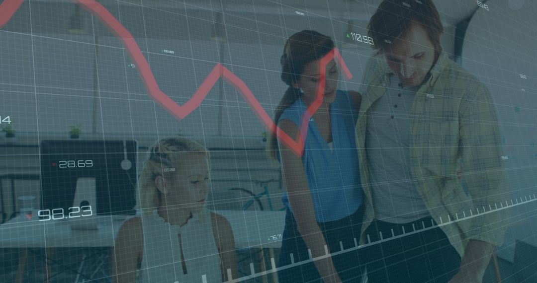 Team Analyzing Financial Data in Open Office Workspace