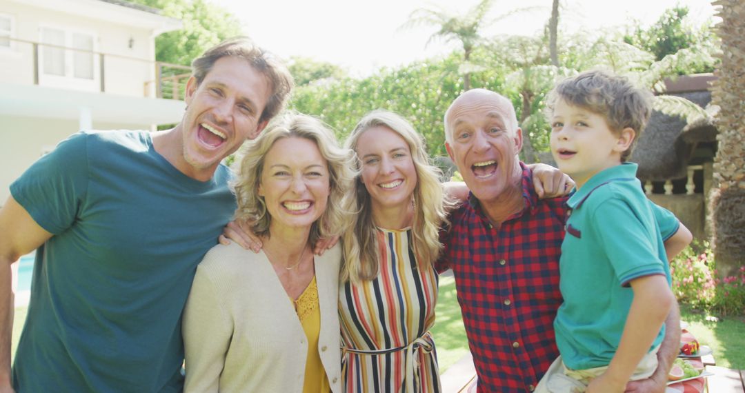 Happy Multigenerational Family Laughing Outdoors