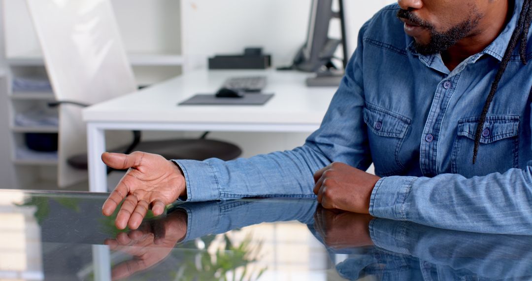 Professional Using Touchscreen Desk in Modern Office