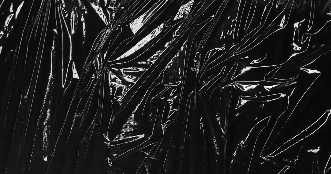Abstract Black Plastic Texture with Reflective Patterns