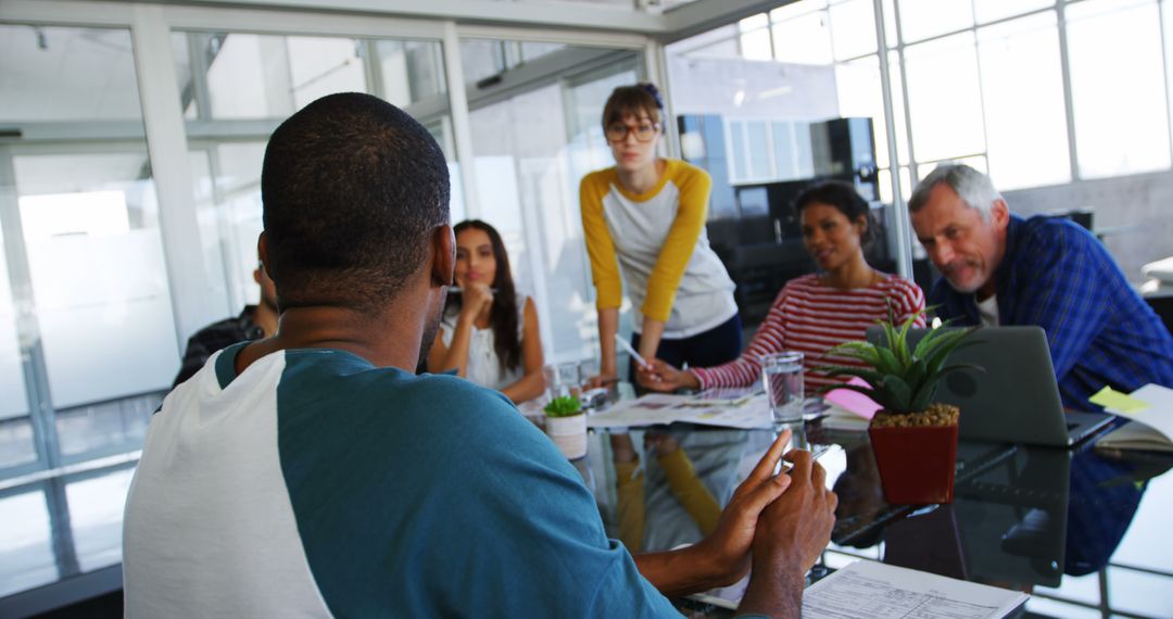Team Building Meeting in Modern Office with Diverse Professionals