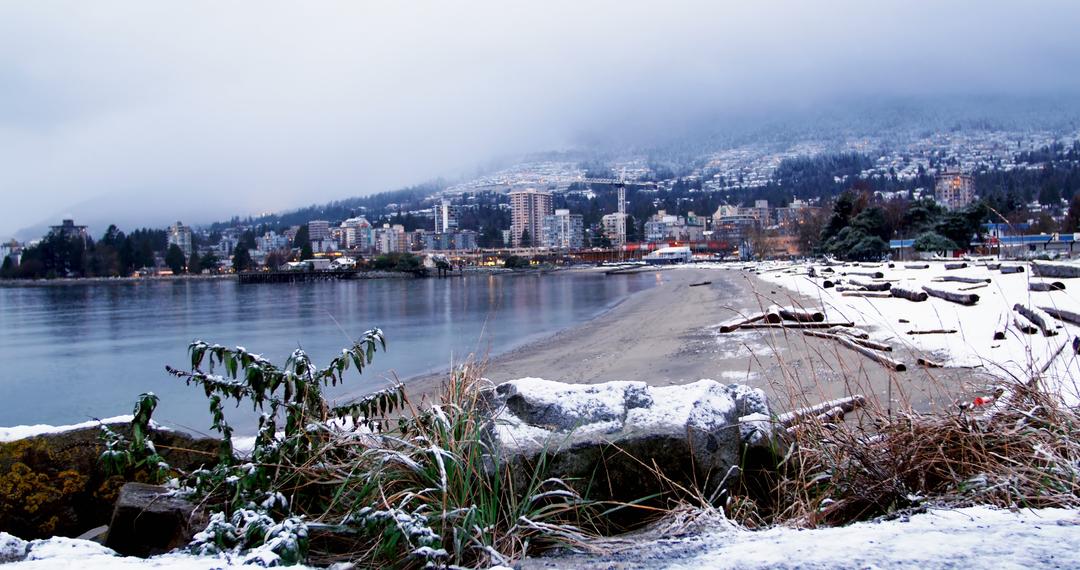 Tranquil Snow-Covered Waterfront of Urban City - Free Images, Stock Photos and Pictures on Pikwizard.com