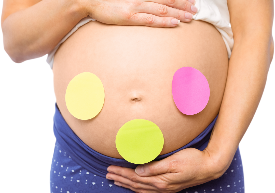 Pregnant woman’s transparent bump with colorful stickers on belly - Download Free Stock Images Pikwizard.com