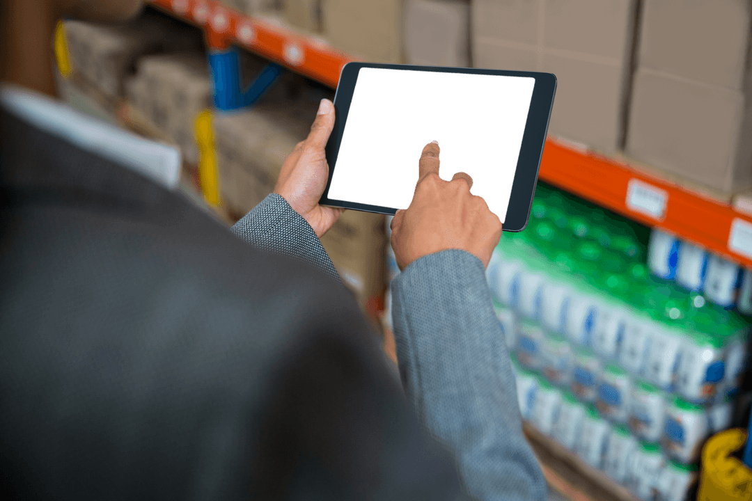 Businesswoman Engaging with Transparent Tablet Screen in Warehouse