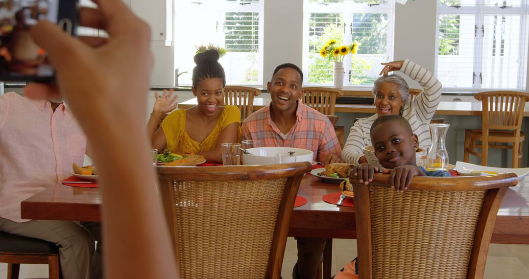 Cheerful African American Family Posing for a Group Photo at Dining Table - Free Images, Stock Photos and Pictures on Pikwizard.com