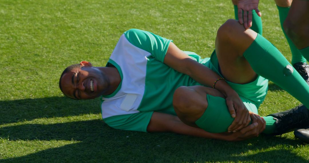 Soccer Player Injured on Field during Match - Free Images, Stock Photos and Pictures on Pikwizard.com