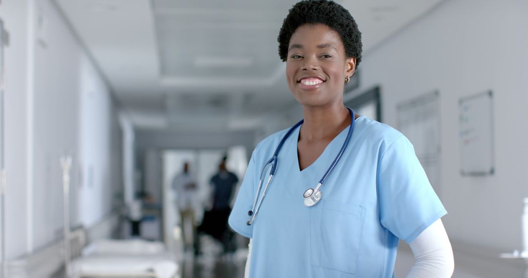 Confident African American Nurse in Hospital Hallway - Free Images, Stock Photos and Pictures on Pikwizard.com