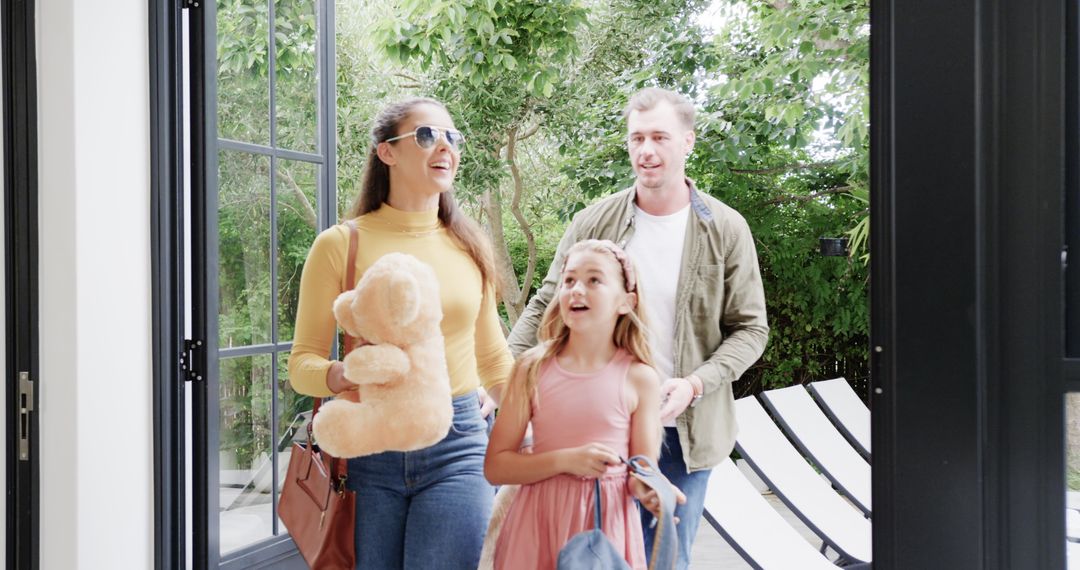 Happy Family Returning Home After Vacation