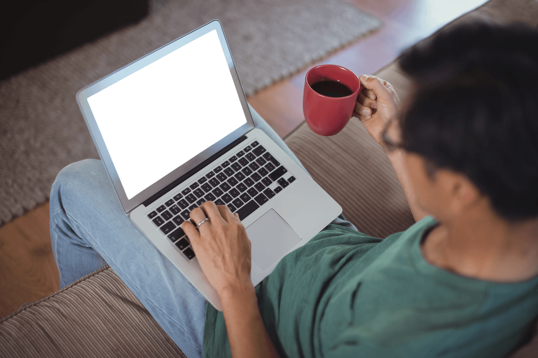 Man Relaxing with Coffee and Laptop Featuring Transparent Screen