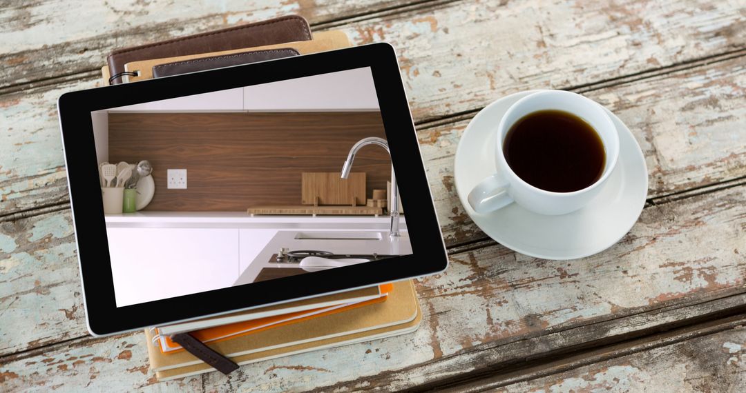 Digital Tablet Displaying Modern Kitchen with Coffee