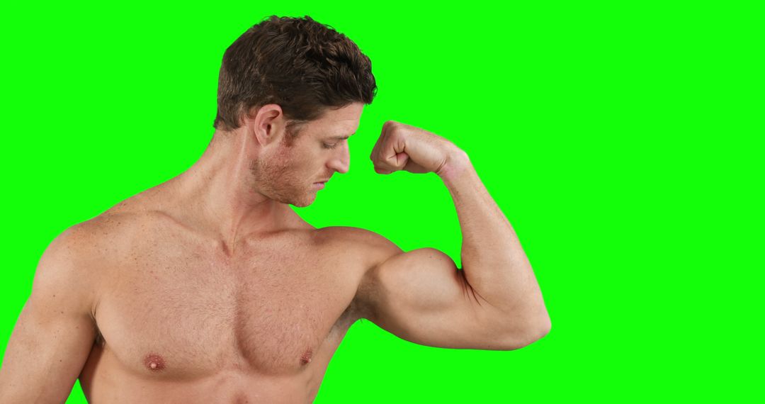 Strong Shirtless Man Flexing Bicep with Green Background - Free Images, Stock Photos and Pictures on Pikwizard.com