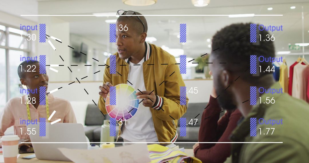 Creative Designers Collaborating with Color Wheel in Modern Workspace