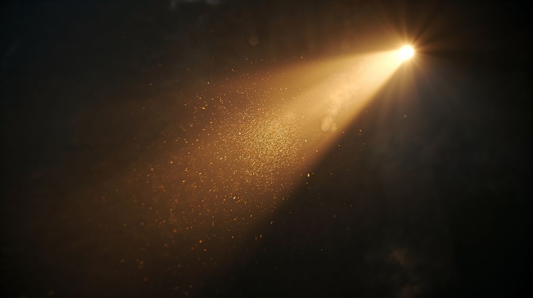 Golden Spotlight Beam Illuminating Dust Particles with Warm Starburst Glow and Haze