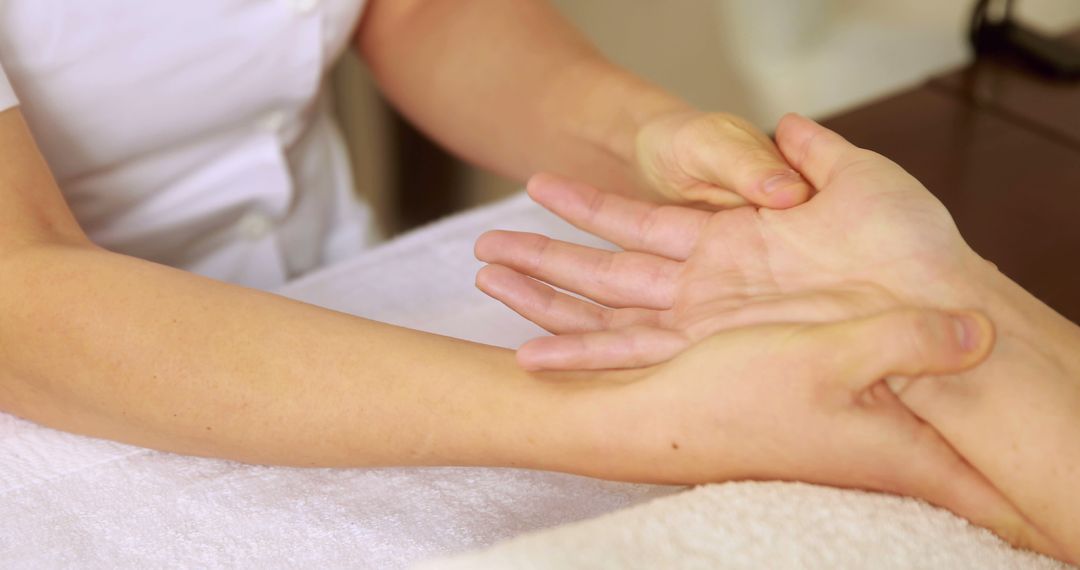 Woman receiving hand massage in spa - Free Images, Stock Photos and Pictures on Pikwizard.com