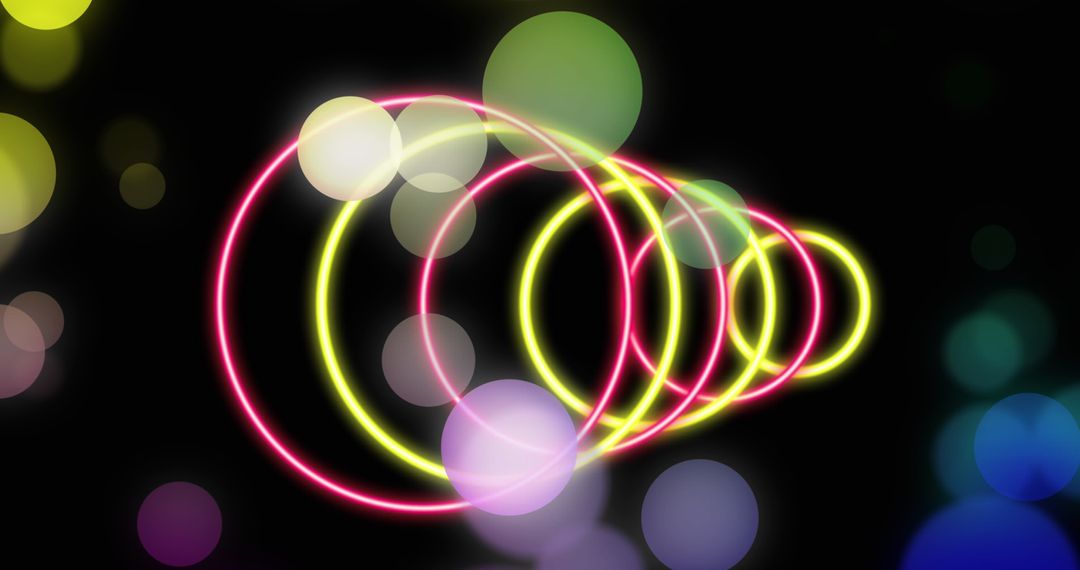 Colorful Light Circles and Shapes on Black Background