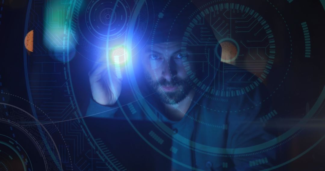 Mysterious Hacker Illuminated by Futuristic Holographic Display