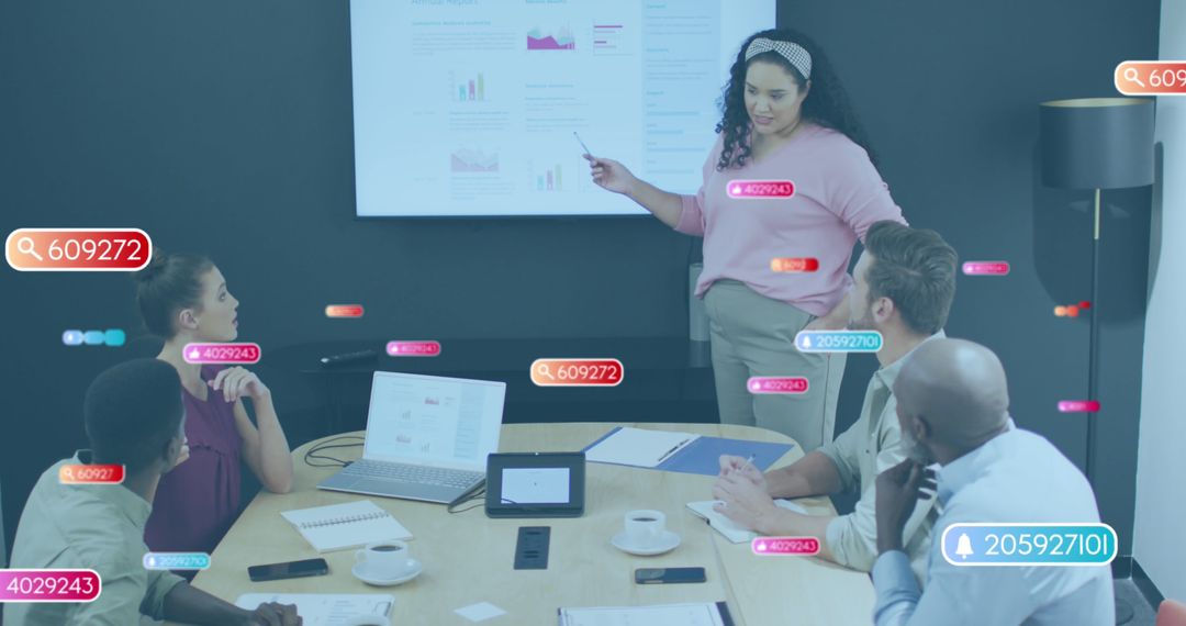 Diverse Team Analyzing Data with Social Media Infographics in Office