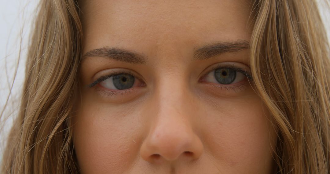 Close-Up of Woman's Eyes on Beach with Natural Light