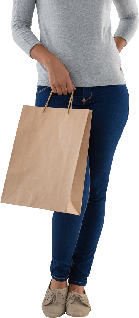 Transparent low section of woman holding brown shopping bag casually - Download Free Stock Images Pikwizard.com