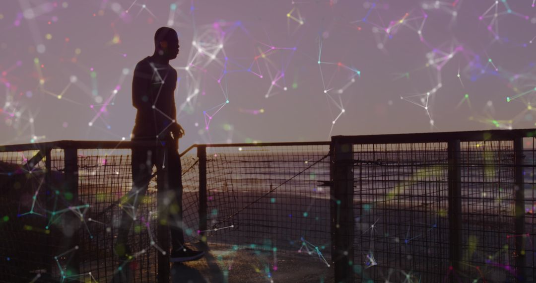 Silhouette of Man Running with Digital Network Overlay at Sunset