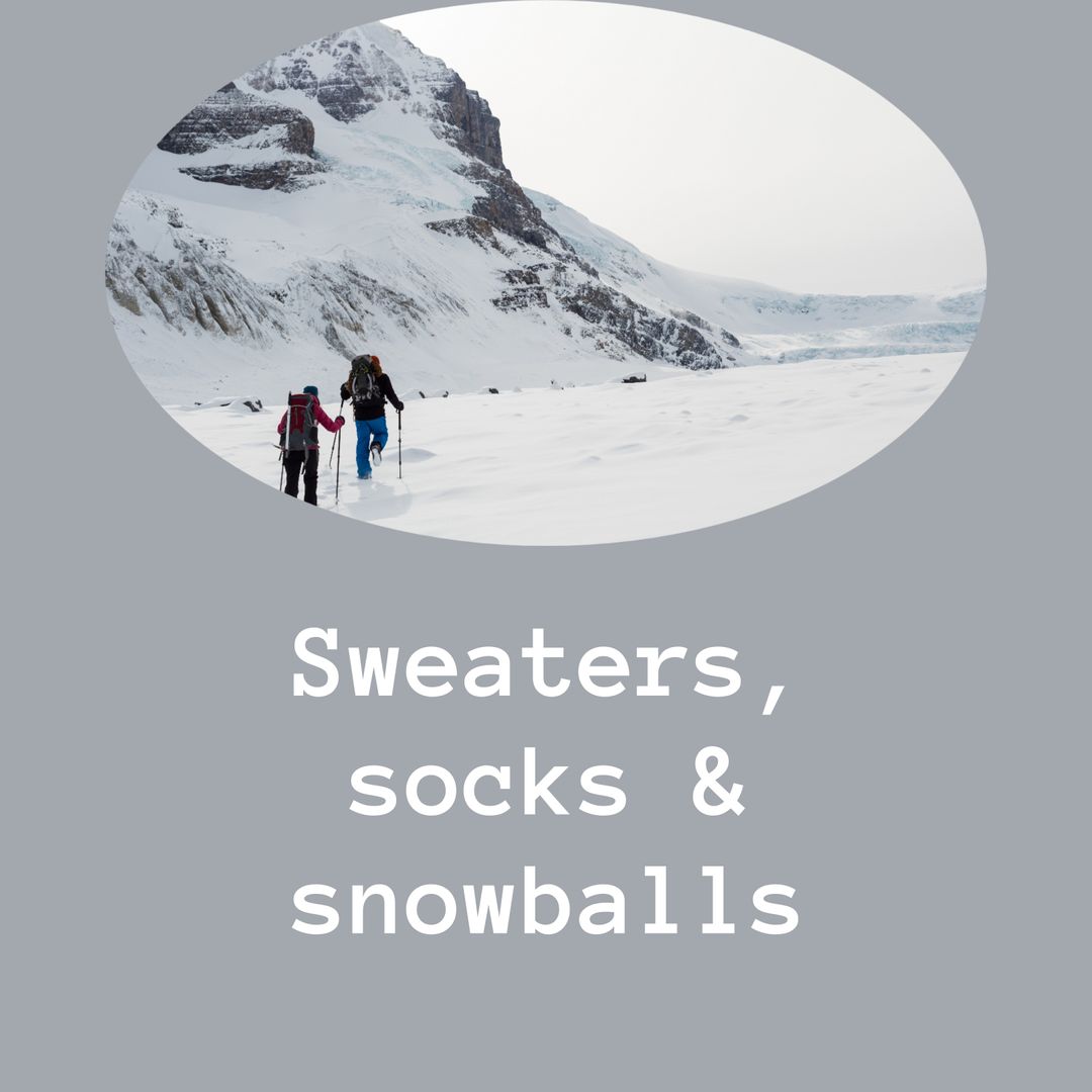 Couple Trekking in Snowy Mountains Captioned 'Sweaters, Socks & Snowballs'