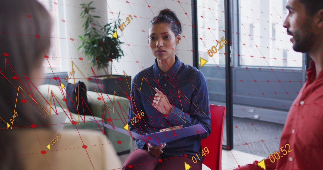 Diverse Team Discussing Work with Data Interfaces