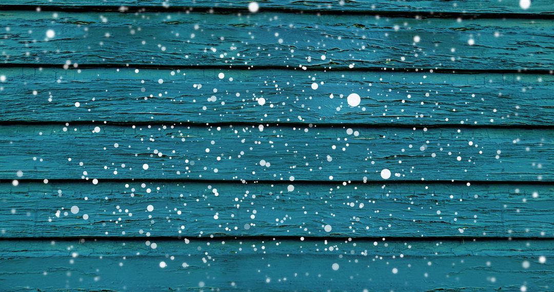 Snowy Charm: Cascading Snowflakes on Blue Wooden Boards