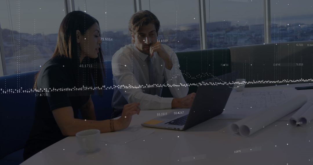 Executives Analyzing Data on Laptop with Floating Digital Graph