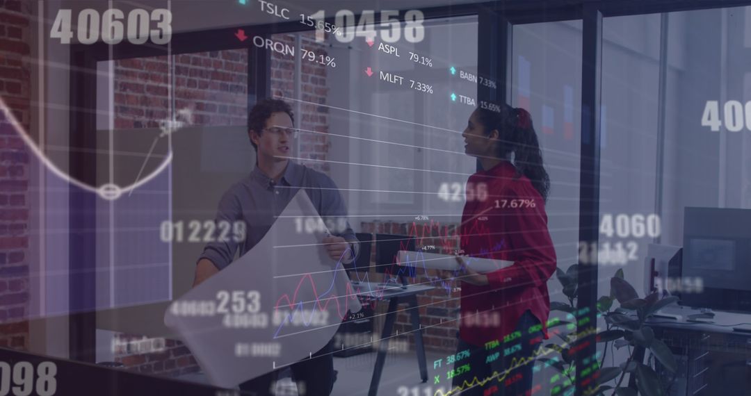 Colleagues Analyzing Data with Overlay of Financial Charts