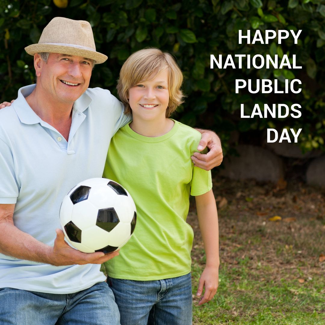 Father and Son Celebrating National Public Lands Day with Soccer