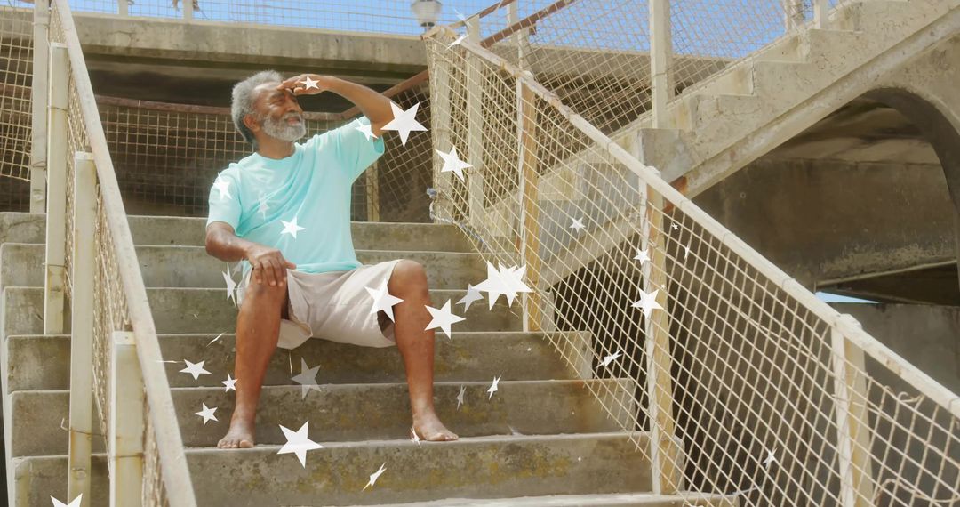 Elderly Man Relaxing on Steps with Star Motif During Daytime