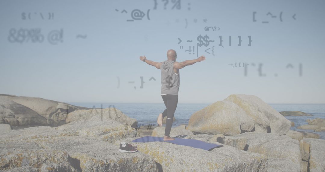 Senior African American Man Practicing Yoga on Rocky Beach with Data Overlay