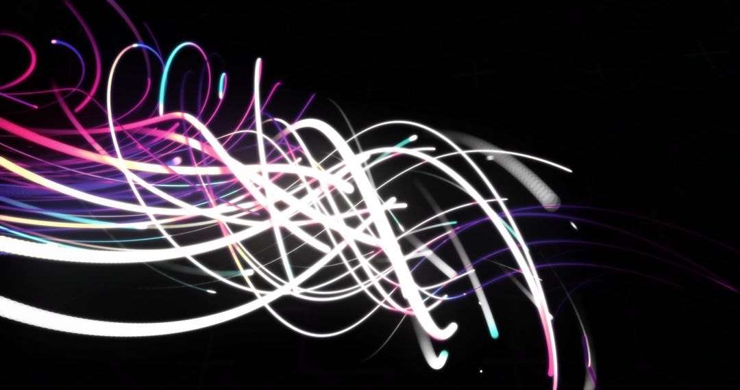 Dynamic Light Trails Forming Abstract Shapes on Black