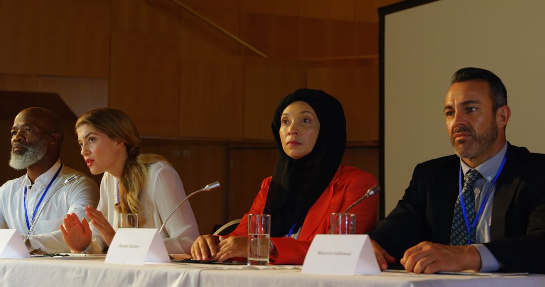Diverse Panel of Serious Business Leaders in Conference
