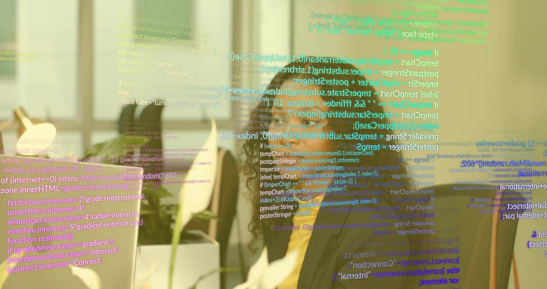 Programmer at Desk with Code Reflections on Glass
