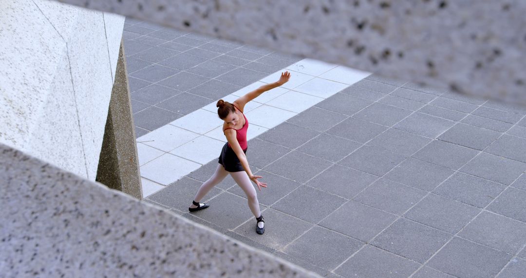 Young Contemporary Dancer Practicing Outdoors Between Sculptures - Free Images, Stock Photos and Pictures on Pikwizard.com