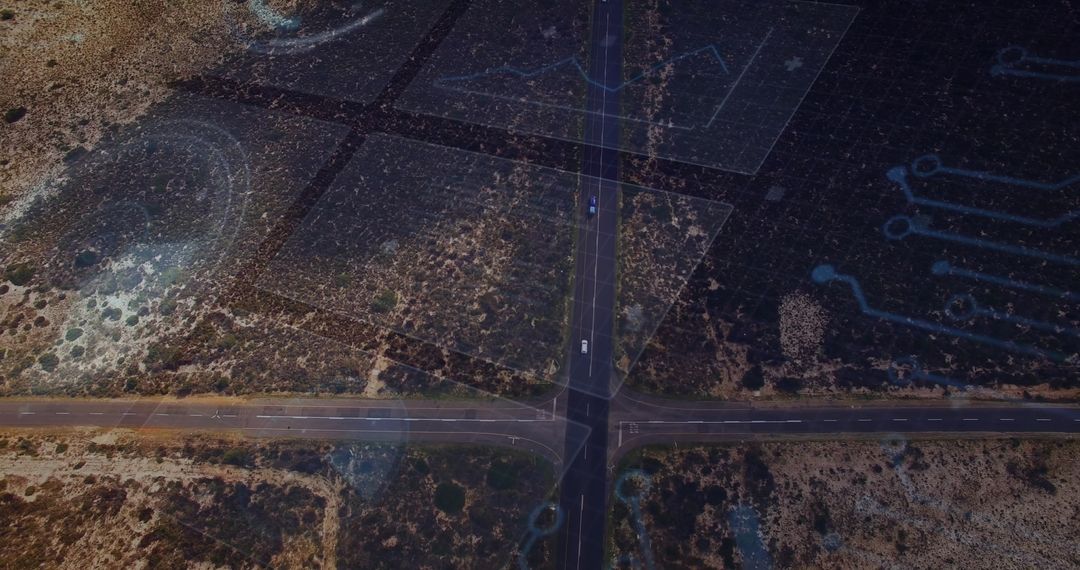 Aerial View of Road Intersection with Digital Navigation Overlay