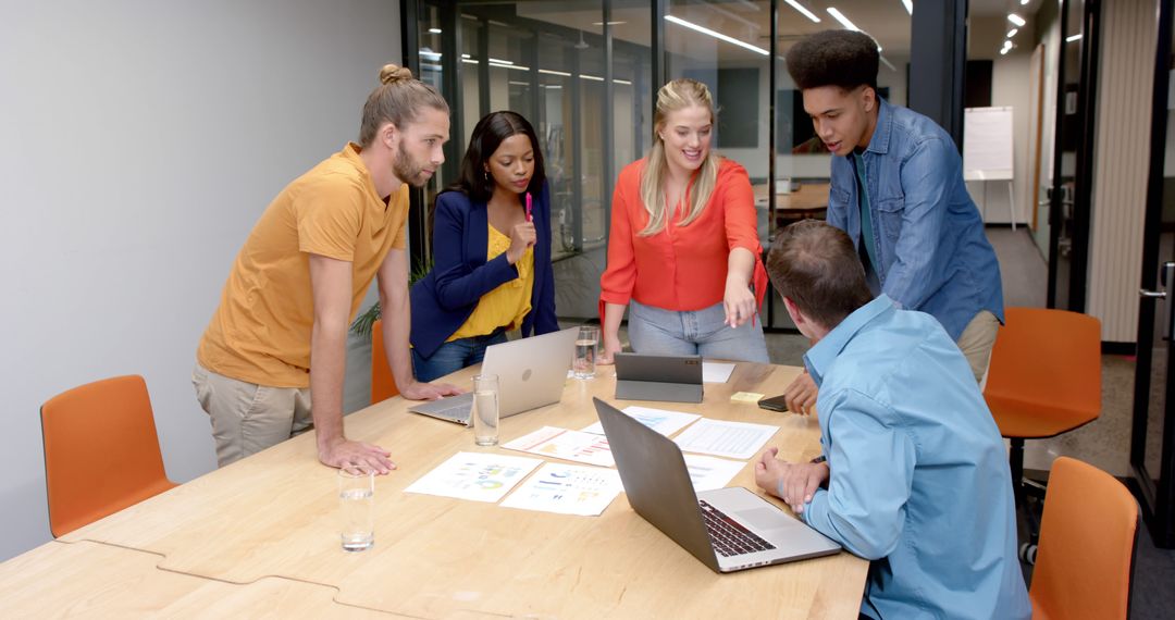 Diverse Business Team Collaborating at Office Meeting Table