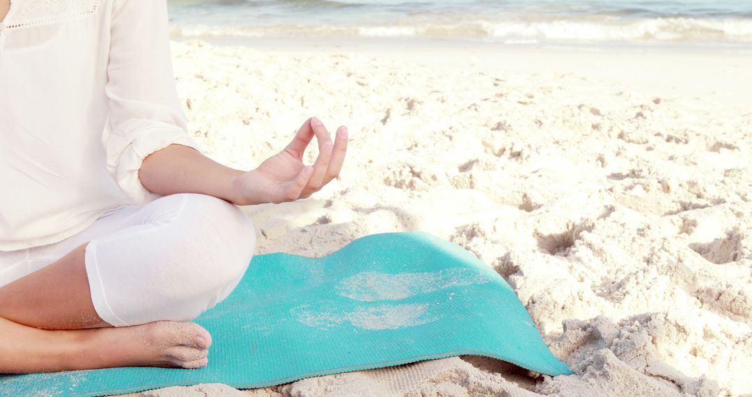 Meditation on Beach Mat with Ocean Waves Background - Free Images, Stock Photos and Pictures on Pikwizard.com