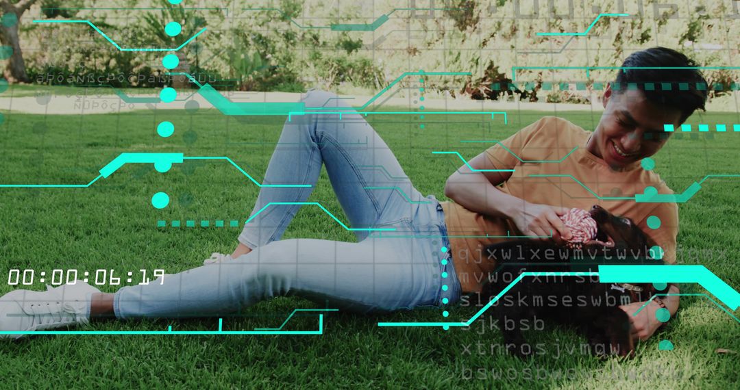 Laughing father tickling daughter on backyard lawn with futuristic digital HUD overlay