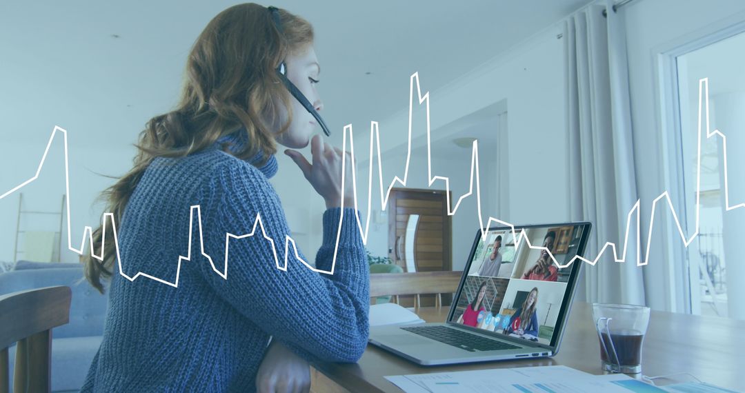 Businesswoman Engaging Video Call with Graphical Overlay Analysis