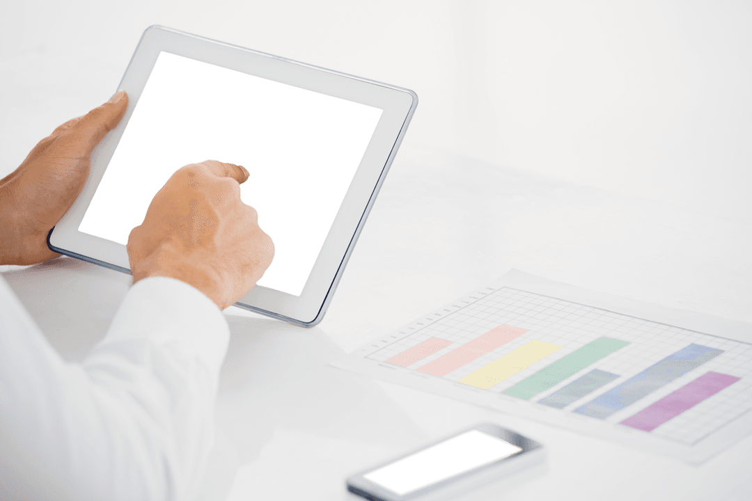 Businessman Utilizing Transparent Tablet at Work