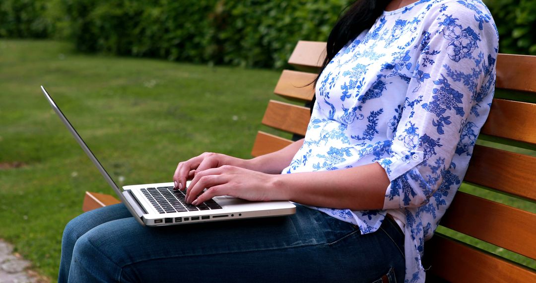 Woman Working on Laptop Outdoors - Free Images, Stock Photos and Pictures on Pikwizard.com