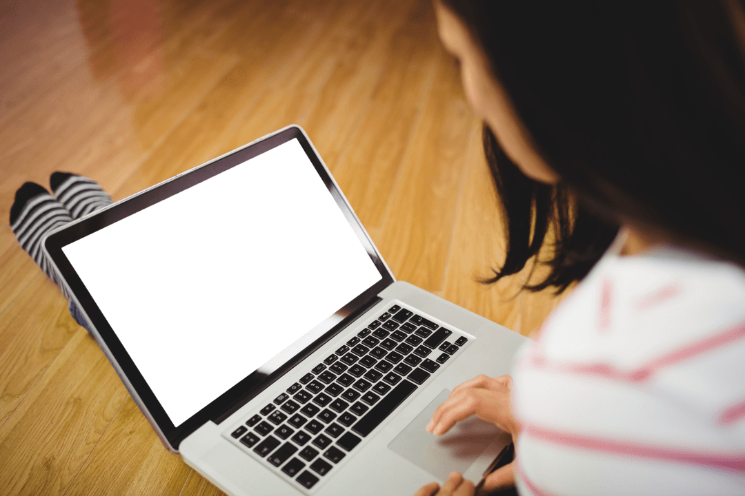 Woman Sitting on Floor Using Laptop with Transparent Screen