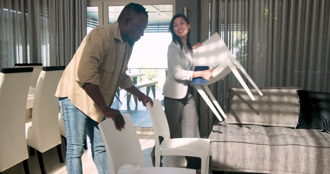 Therapist and Client Collaborating to Prepare Group Therapy Space