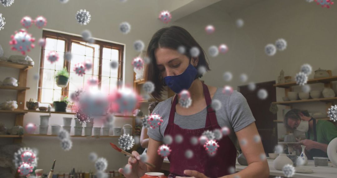 Masked Artisan Pottery Crafting Amid Floating Virus Cells